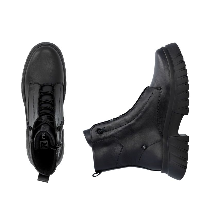 Schwarze Rieker Damen Biker Boots W1879-00 aus Glattleder mit Reißverschluss. Schuh von oben, liegend.