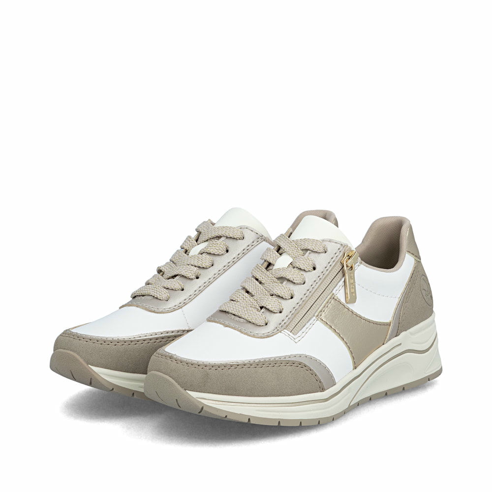 Chaussures à lacets Rieker blanches femme N9504-80 avec fermeture éclair. Chaussures inclinées sur le côté.