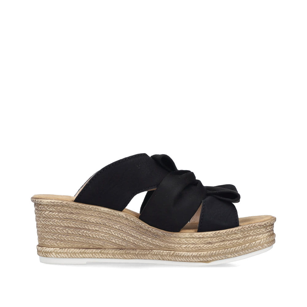 Schwarze Rieker Damen Pantoletten 68789-00 mit dekorativer Schleife. Schuh Innenseite.