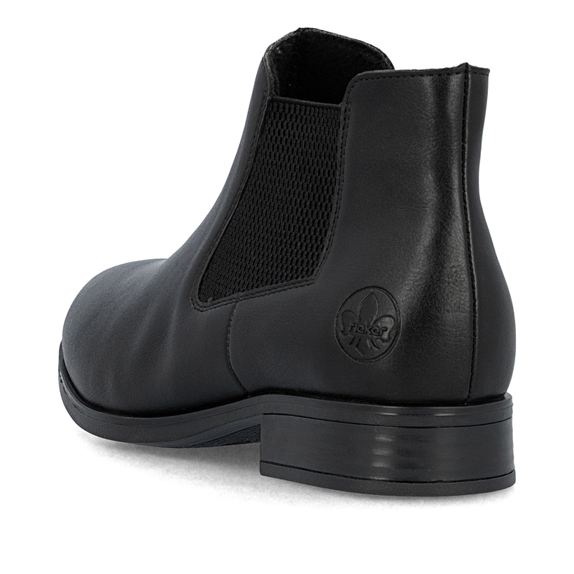 Schwarze Rieker Damen Chelsea Boots 77050-00 mit einem Gummizug. Schuh von hinten.