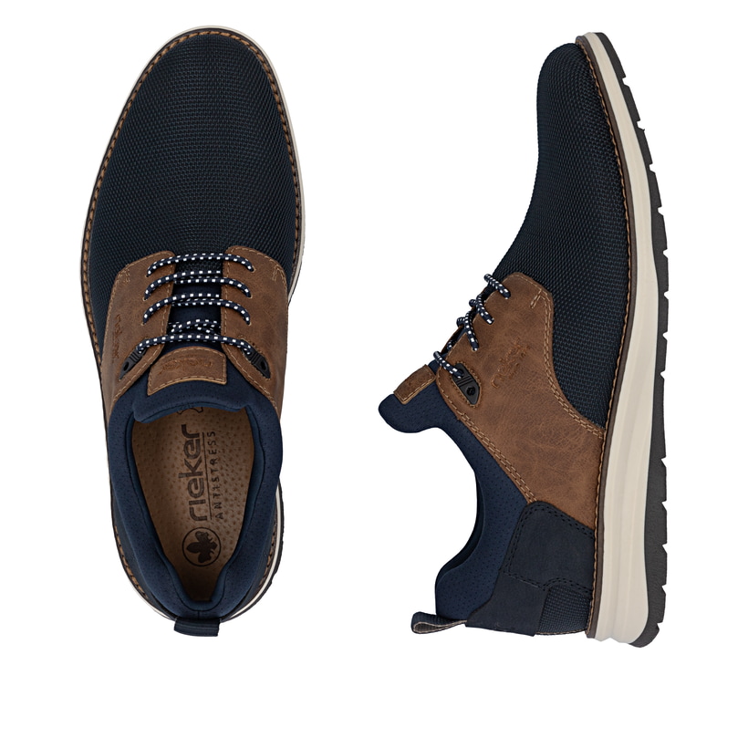 Mocassins Rieker bleus pour hommes 14750-15 avec bande élastique. Chaussure vue de dessus, couchée.