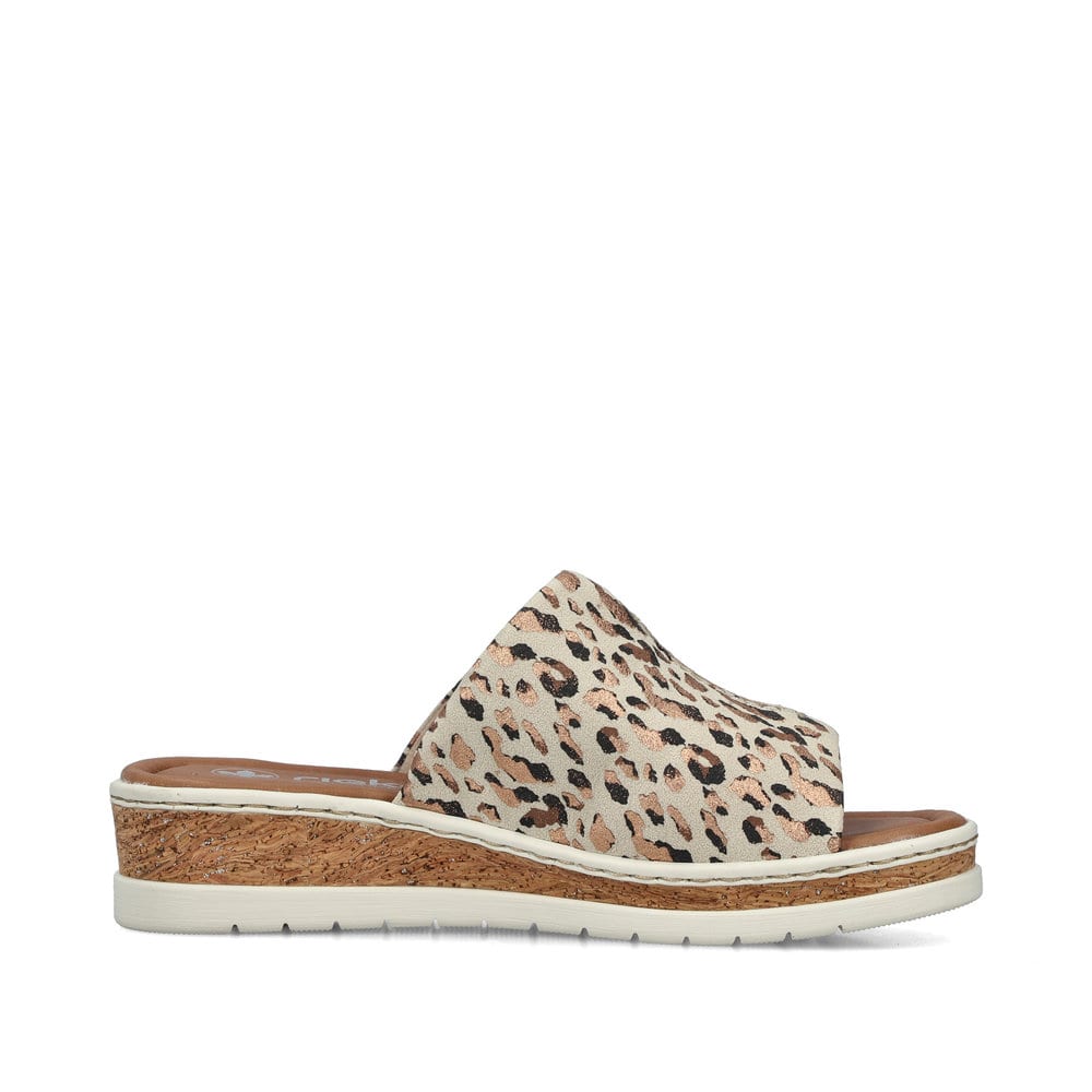 Mules Rieker beiges pour femme V4188-60 avec imprimé animal à la mode. Côté intérieur de la chaussure.