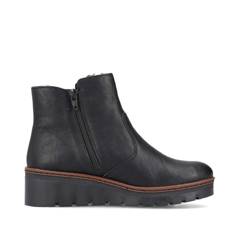 Bottines Rieker noires pour femmes X9165-00 avec fermeture éclair. Côté intérieur de la chaussure.